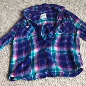 A button up plaid shirt